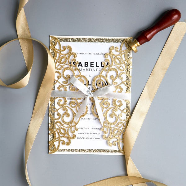 /1067110-2523-thickbox/gold-glitter-laser-cut-wedding-invitations-with-white-ribbon-ws011.jpg