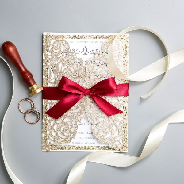 /1067117-2544-thickbox/classic-gold-shimmer-glittery-laser-cut-wedding-invitations-with-red-ribbon-bow-ws018.jpg