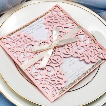 Blush pink laser cut wedding invitations with ivory ribbon WS066
