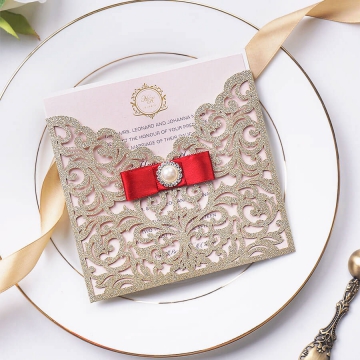 Luxe gold square laser cut invite with red ribbon and pearl WS165